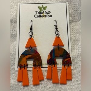 TomUs5 collection earrings. The slay status in our Mandarin Express cluster!